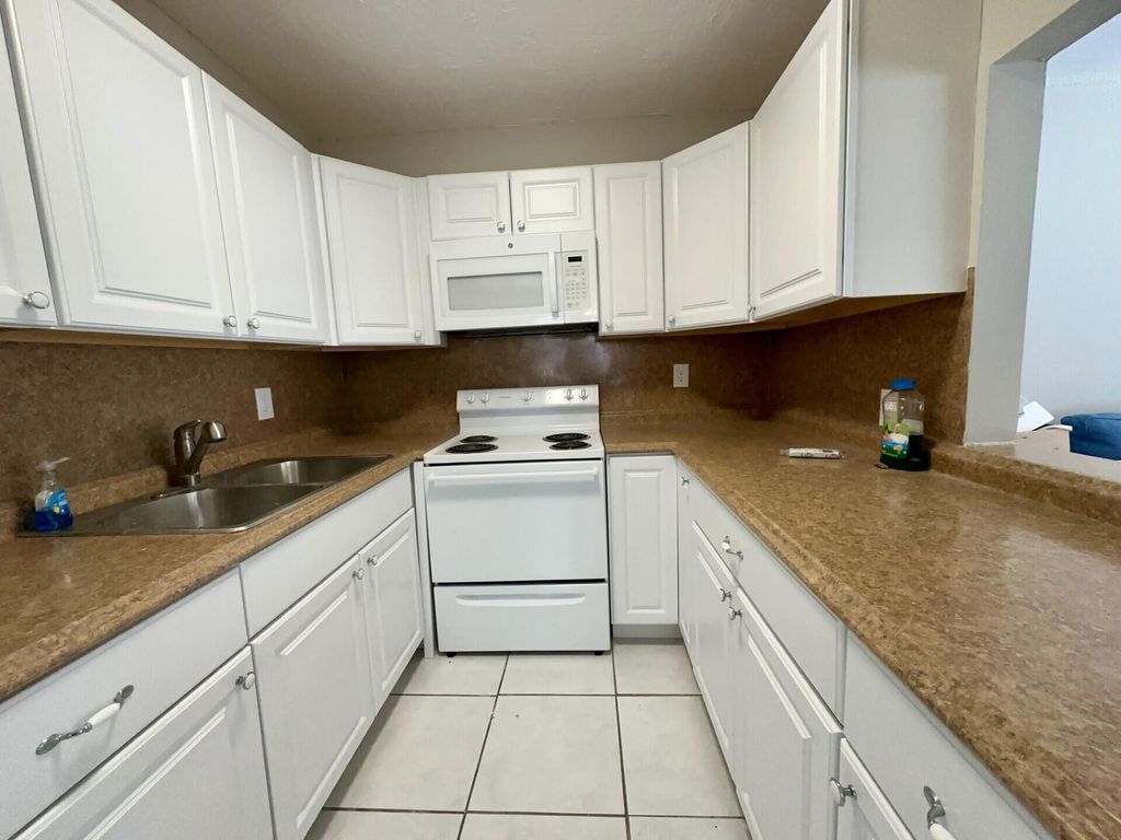 Photo of 165 Coventry G, West Palm Beach, FL 33417 (MLS # B26027067)