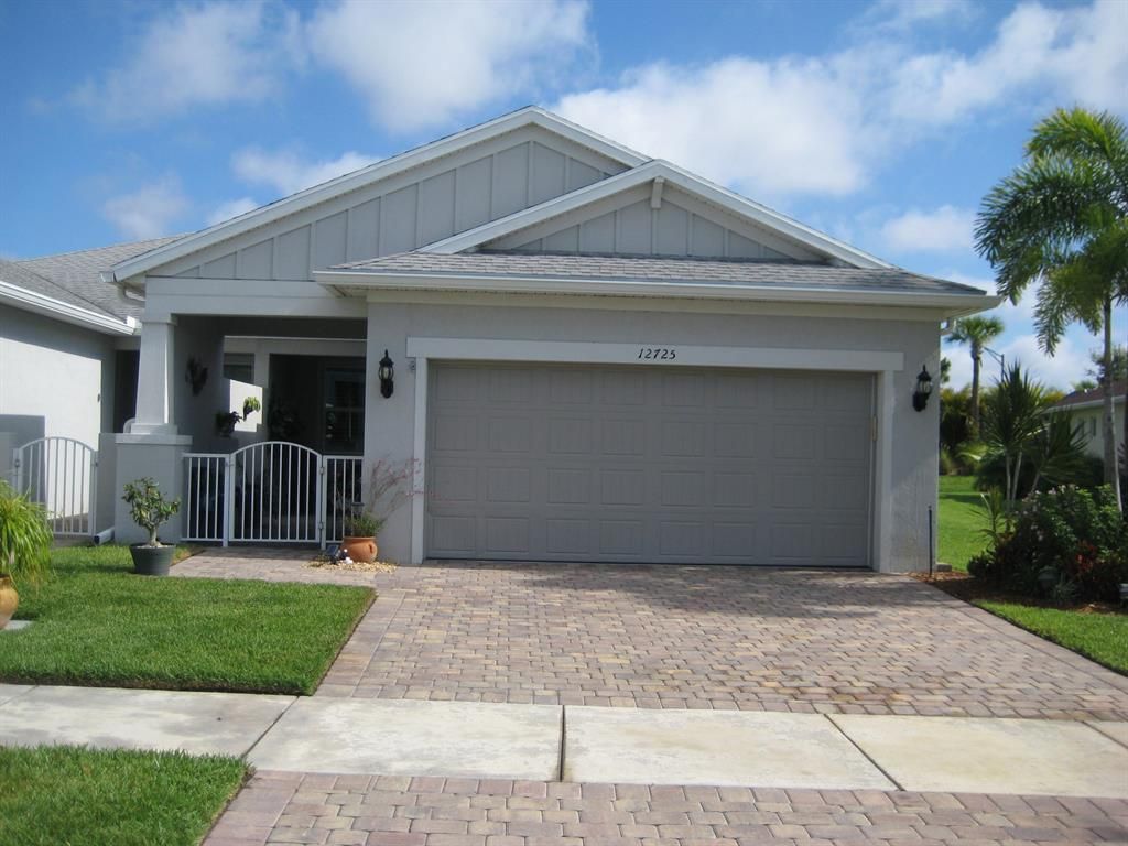 Photo of 12725 SW Gingerline Drive, Port Saint Lucie, FL 34984 (MLS # R10806406)