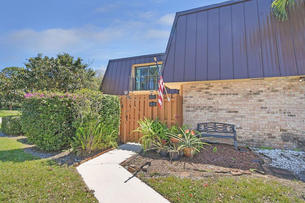 Photo of 5670 SE Windsong Lane #403, Stuart, FL 34997 (MLS # R10976451)