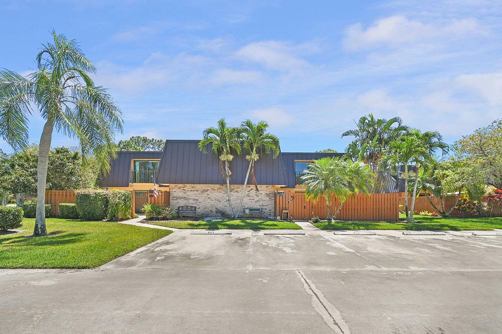 Photo of 5670 SE Windsong Lane #403, Stuart, FL 34997 (MLS # R10976451)