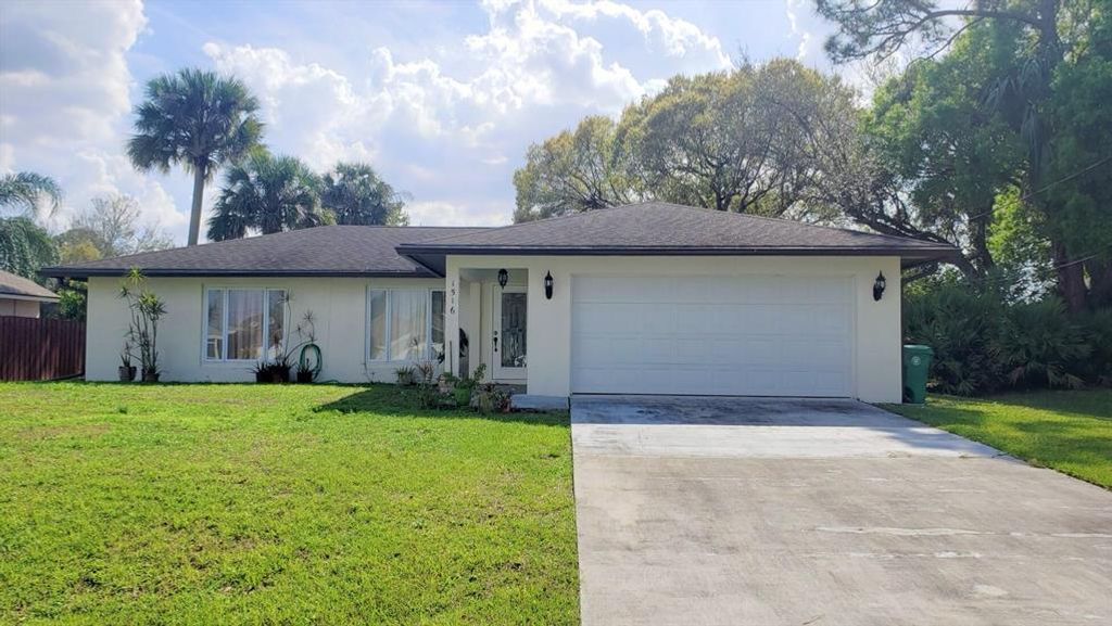 Photo of 1516 SW Herder Road, Port Saint Lucie, FL 34953 (MLS # R10697031)