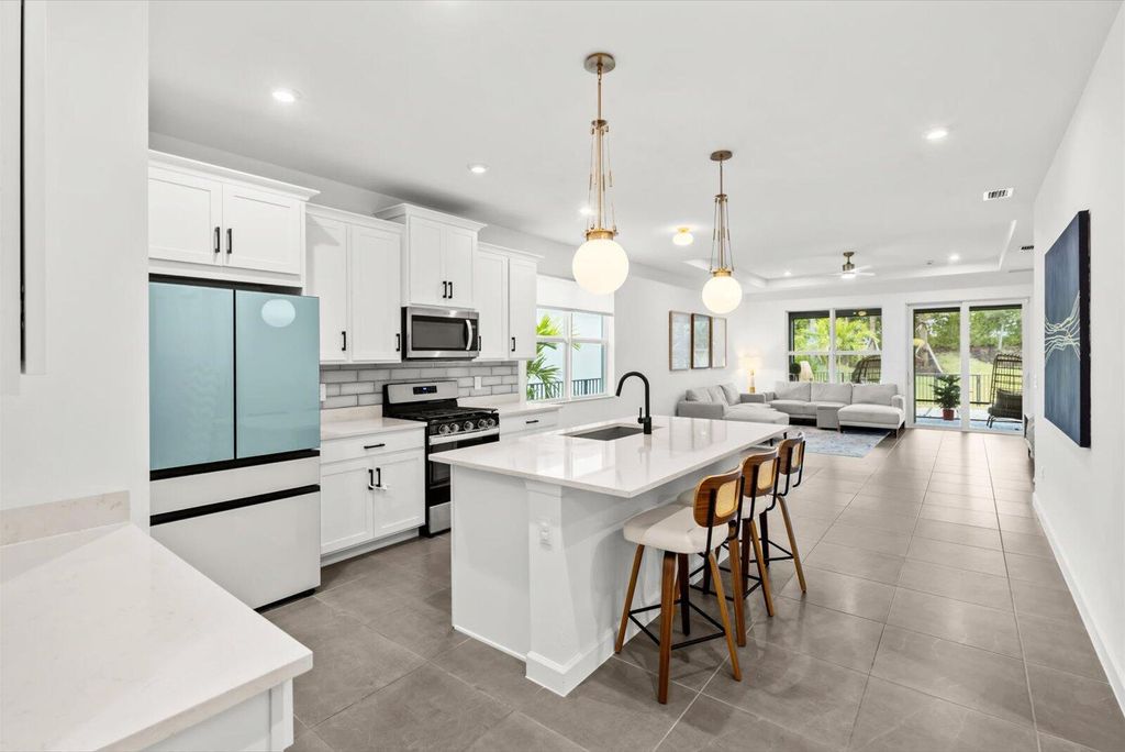 Photo of 9165 SW Remy Lane, Port Saint Lucie, FL 34987 (MLS # R11146788)