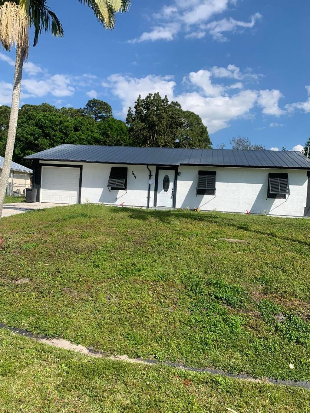 Photo of 2473 SW Calgan Street, Port Saint Lucie, FL 34953 (MLS # R10965527)