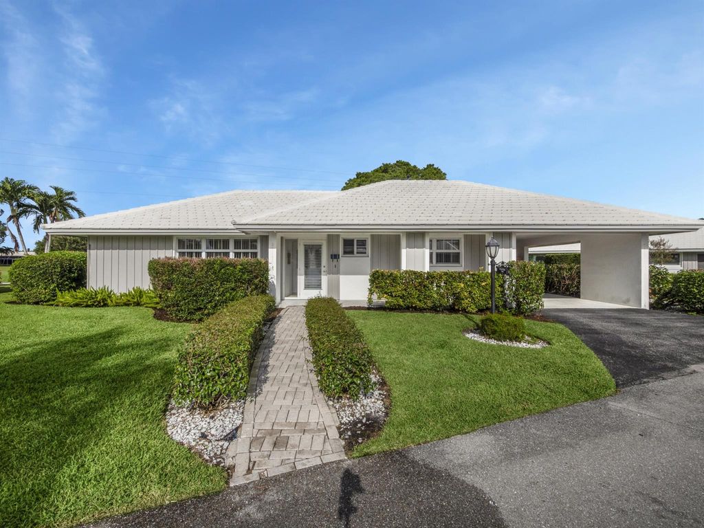 Photo of 119 Driftwood Circle, Atlantis, FL 33462 (MLS # R10923620)