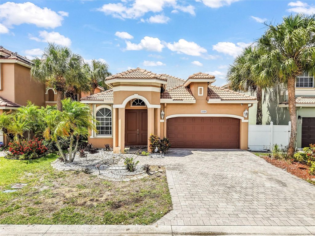 Photo of 4066 Coontie Court, Lake Worth, FL 33462 (MLS # F10511597)