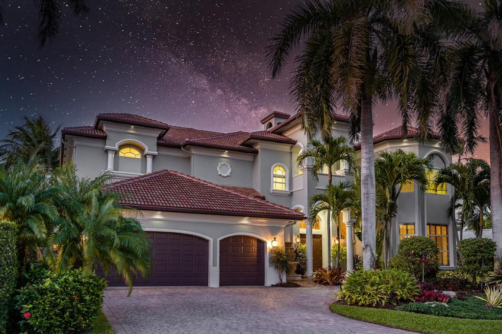 Photo of 945 Banyan Drive, Delray Beach, FL 33483 (MLS # R10710868)