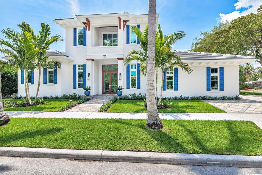 Welcome to your dream home! This stunning new construction, British West Indies-designed house is a true masterpiece with many custom details, boasting soaring ceilings, abundant natural light, and an open floorplan that seamlessly connects the living room, dining, and kitchen, making it ideal for entertaining. Located on the Intracoastal block in a coveted coastal Historic neighborhood.

As you enter the house, you'll be greeted by a grand foyer that sets the tone for the rest of the home. The fully retractable sliding door wall suits Florida's indoor/outdoor lifestyle.

The kitchen is a chef's dream featuring top-of-the-line appliances, six burner gas range, custom cabinetry, an expansive quartz island, and a decorative marble backsplash. The 1st floor primary suite is a peaceful retreat that will make you feel like you're living in a luxury hotel. With a spacious bedroom, two walk-in closets, and a spa-like bathroom with a rain shower and luxurious tub. The other three bedrooms are equally impressive, each with an en-suite bathroom, ample closet space, and a private covered balcony. Additional feature includes an oversized 2 car garage. 

The expansive covered loggia is designed for entertaining and relaxation and overlooks the sparkling, heated pool with a sun shelf, water features and lush landscaping. It is appointed with an outdoor kitchen and BBQ grill. Ideal for Florida living!