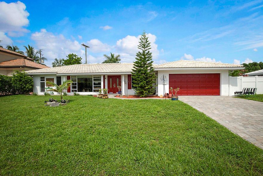 Come and see this beautiful home with 3-bedroom, 2 1/2-bathroom and a large den.   Nestled on a tranquil cul-de-sac just down the street for Dan Witt park in the wonderful city of Lighthouse Point.  Delight in an open, sunlit kitchen, a luxurious master suite with a spacious walk-in closet, and a large master bath. The home features ceramic floors throughout and all plumbing drain lines have been replaced completely with new PVC lines.  Between Ft. Lauderdale and West Palm this is prefect location to enjoy everything that South Florida has to offer.
