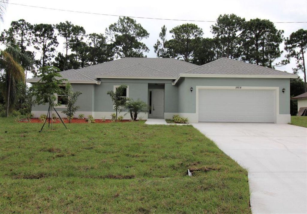 Photo of 1988 SW Hillman Street, Port Saint Lucie, FL 34953 (MLS # R10776293)