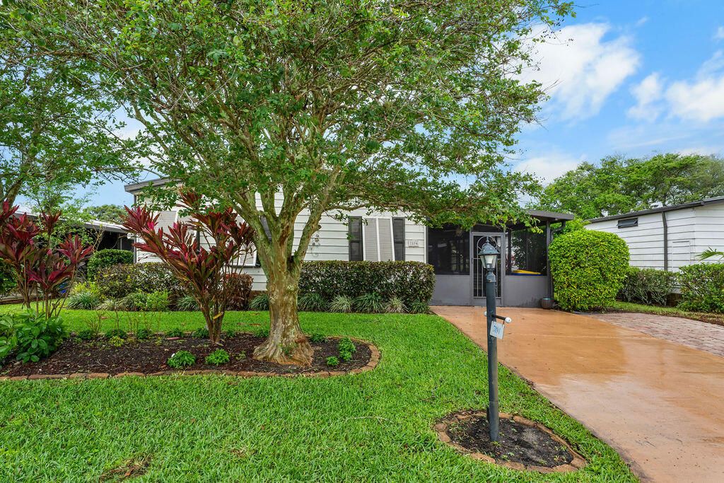 Photo of 7894 SE Saratoga Drive E, Hobe Sound, FL 33455 (MLS # B26013943)