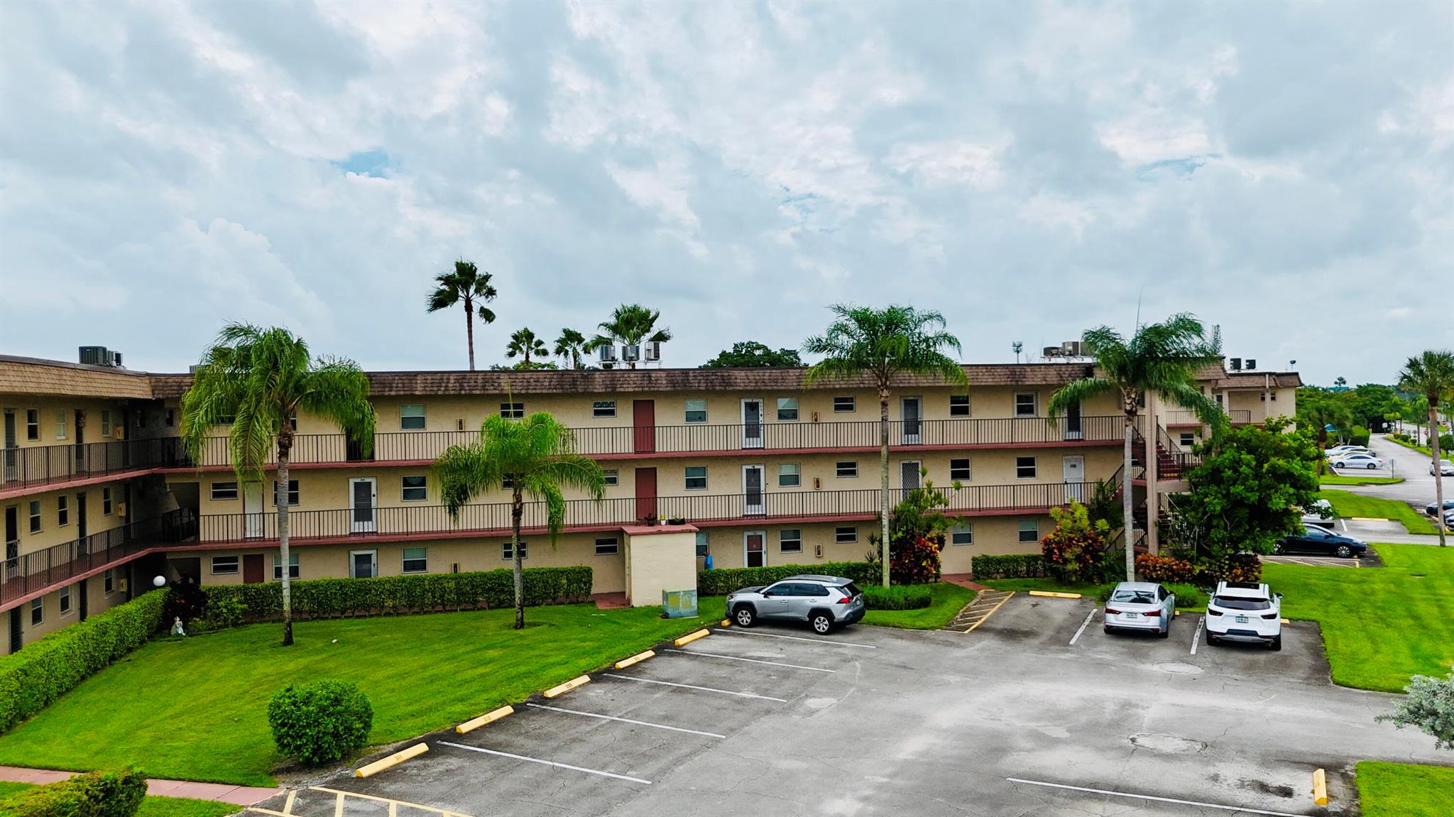 Welcome to this beautifully updated 2-bedroom, 2-bathroom condo in the vibrant 55+ community of Lakeside Village. Featuring a desirable split floor plan, this light-filled unit offers both comfort and functionality.Enjoy a spacious layout with generous closet space throughout. The bathrooms are tastefully renovated--one with a step-in shower and the other with a relaxing bathtub. The charming kitchen features eye-catching blue tile countertops, classic white cabinetry, and plenty of space to cook and entertain.Additional highlights include brand new flooring being installed in the bedrooms, fresh interior paint, and hurricane-impact windows throughout for peace of mind.Lakeside Village offers a welcoming community atmosphere with great amenities, perfect for enjoying your best