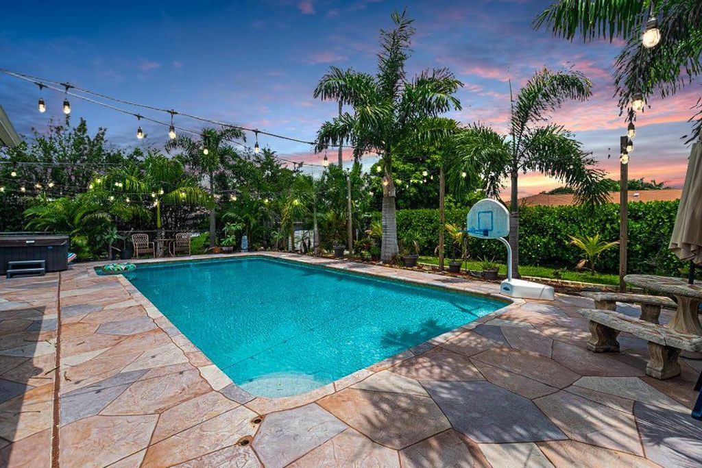 Photo of 717 SE White Avenue, Port Saint Lucie, FL 34983 (MLS # R11001370)