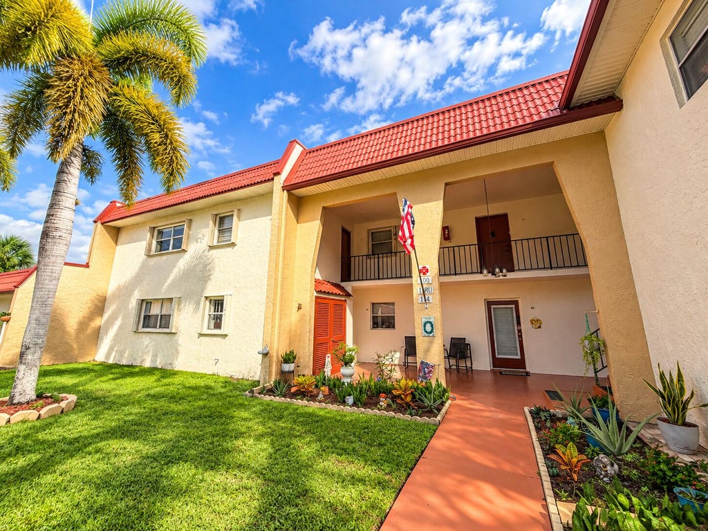 Photo of 112 LAKE DORA Drive, West Palm Beach, FL 33411 (MLS # B26093137)