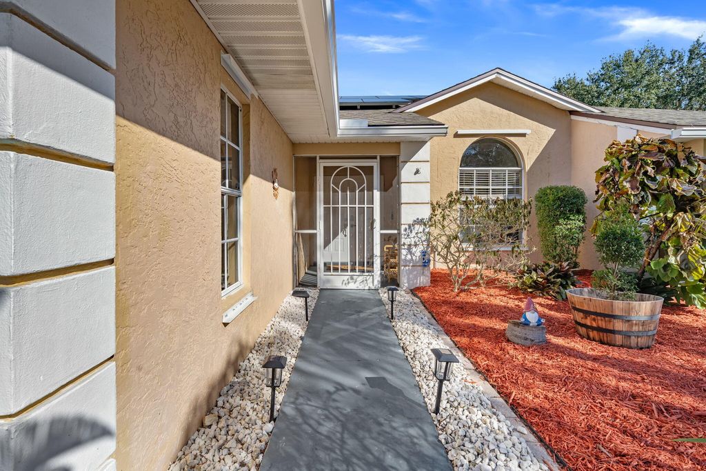 Photo of 1849 SW Kimberly Avenue, Port Saint Lucie, FL 34953 (MLS # R11160718)
