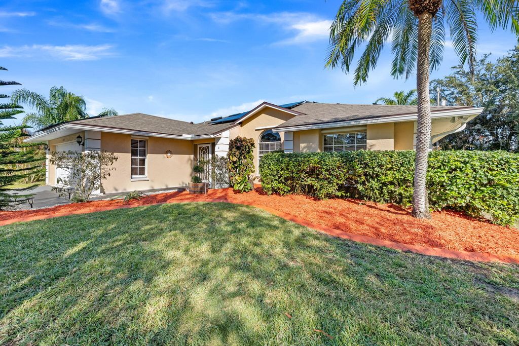Photo of 1849 SW Kimberly Avenue, Port Saint Lucie, FL 34953 (MLS # R11160718)