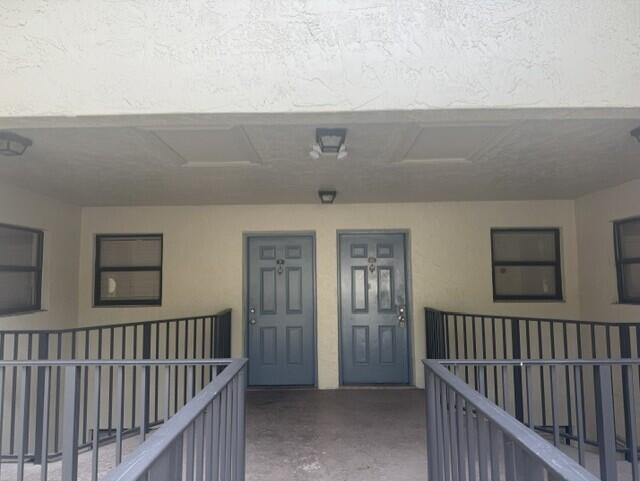 Photo of 1495 LAKE CRYSTAL Drive #G, West Palm Beach, FL 33411 (MLS # B26068851)