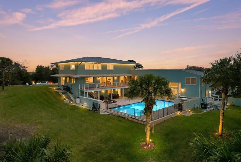 Photo of 3712 E Mockingbird Hill, Jensen Beach, FL 34957 (MLS # R11166403)