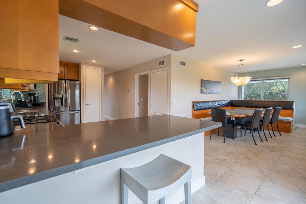 Photo of 3712 E Mockingbird Hill, Jensen Beach, FL 34957 (MLS # R11166403)