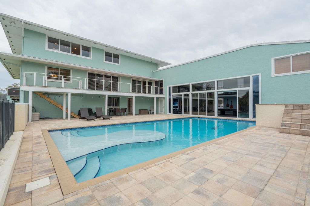 Photo of 3712 E Mockingbird Hill, Jensen Beach, FL 34957 (MLS # R11166403)