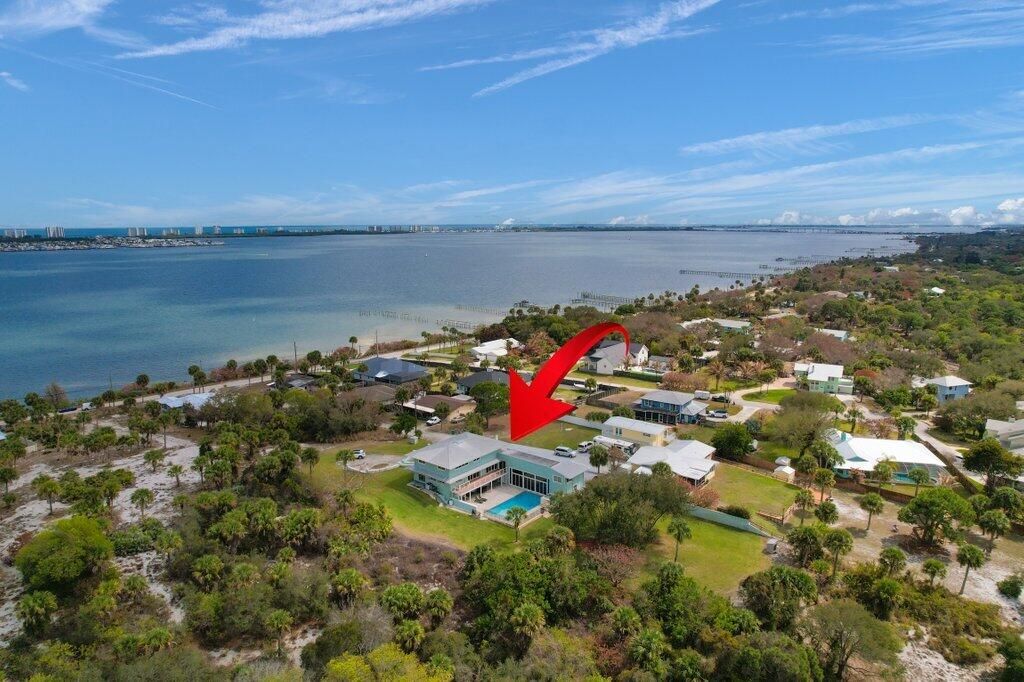 Photo of 3712 E Mockingbird Hill, Jensen Beach, FL 34957 (MLS # R11166403)