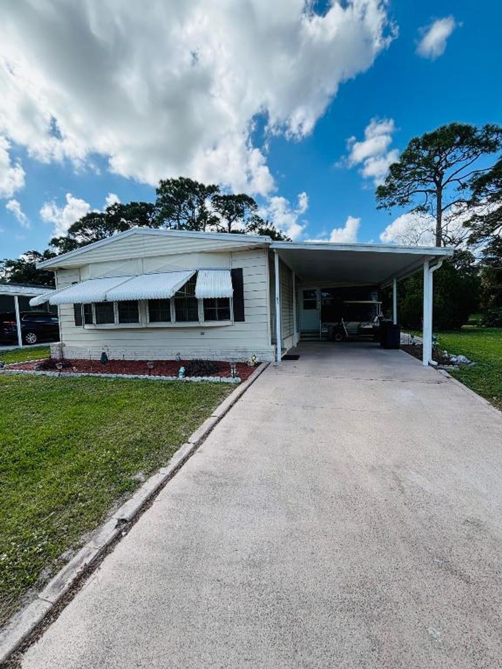 Photo of 151 E Caribbean, Port Saint Lucie, FL 34952 (MLS # R11068461)