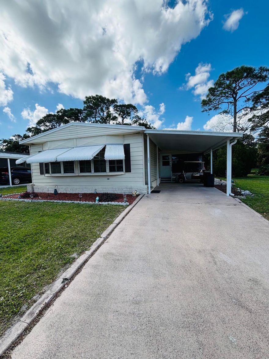 Welcome to one of the best homes for sale in Spanish Lakes Golf Village, an active 55+ community in the heart of Port St. Lucie, FL. This 2-bedroom, 2-bath home offers everything you need for comfortable living, with breathtaking views of the golf course and pond right in your backyard.  Inside you'll find a partially furnished home with many upgrades and a newer AC unit  for added peace of mind. Your land lease includes private golf course,(free) pool, fitness room, pickleball, tennis, shuffleboard , a breakfast cafe and much more. Trash and lawn maintenance included. Don't miss this opportunity-homes in this desirable community don't stay on the market for long!
