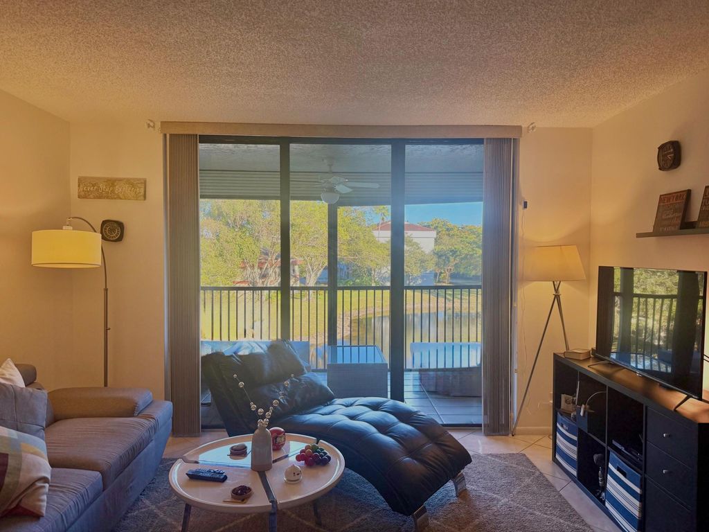 Photo of 3050 NW 42nd Avenue #C302, Coconut Creek, FL 33066 (MLS # R11162011)