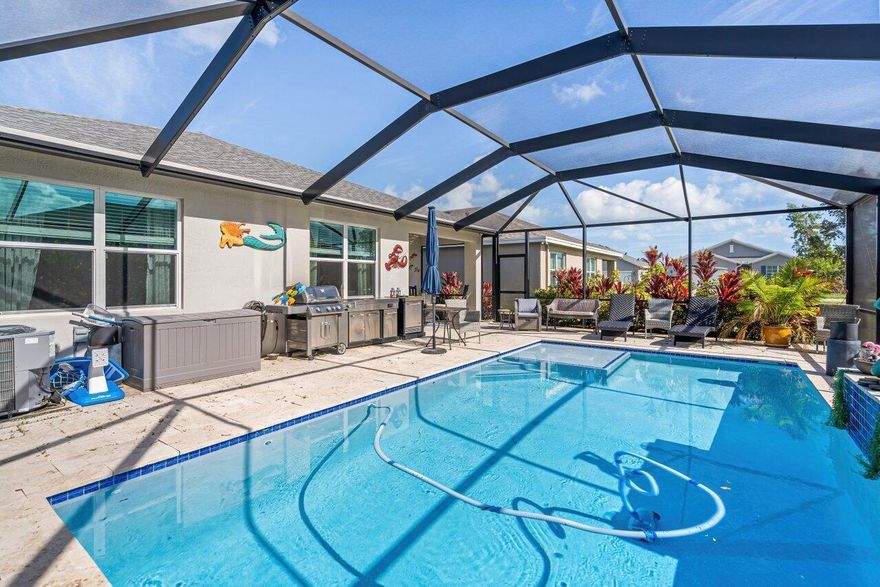 ** NEWLY BUILT POOL HOME CLOSE TO BEACH ** Built in 2020** The home is located in the Gated Community of Seawalk . Step inside this FULLY FURNISHED, TURN KEY gorgeous Home featuring 3 Bedrooms, 2 Baths, 2 Car Garage with a Custom Built Saltwater Heated Pool  featuring travertine patio, lighting, waterfall, jets with swim out and sun decks. A few upgrades include: IMPACT WINDOWS, Crown Moulding, Garage Cabinets, Wood Plank Tile Throughout (NO CARPET). Stainless Appliances, Center Island Overlooking Living & Dining with Quartz Countertops, Screened in Patio (upgraded screen) with Covered Area. Seawalk is less than 3 miles to the Jensen Public Beach and within WALKING distance to Downtown Jensen, shops, restaurants, waterway grocery stores, dry cleaner, etc. HOA COVERS LAWN CARE.