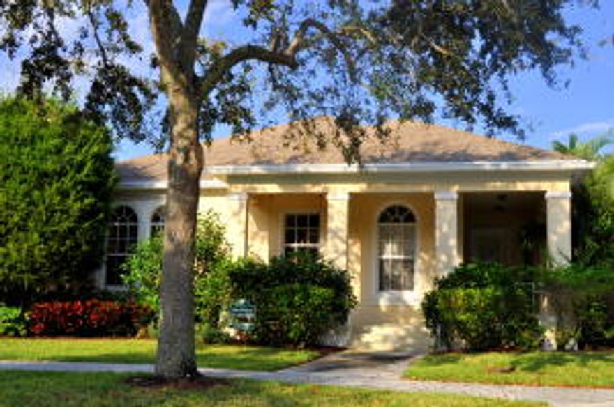 Absolutely beautiful three bedroom home on a large corner lot. This highly desired Abacoa home features wood floors, granite counter tops, a spacious screened porch overlooking the lovely yard, and two car garage. This home is located in Cambridge at Abacoa. Jupiter's A rated schools, and within moments to all South Florida has to offer. The finest beaches, shopping, fine dining, world class golf and tennis, I-95/turnpike and PBI. Seller approved sales price at $399,000.