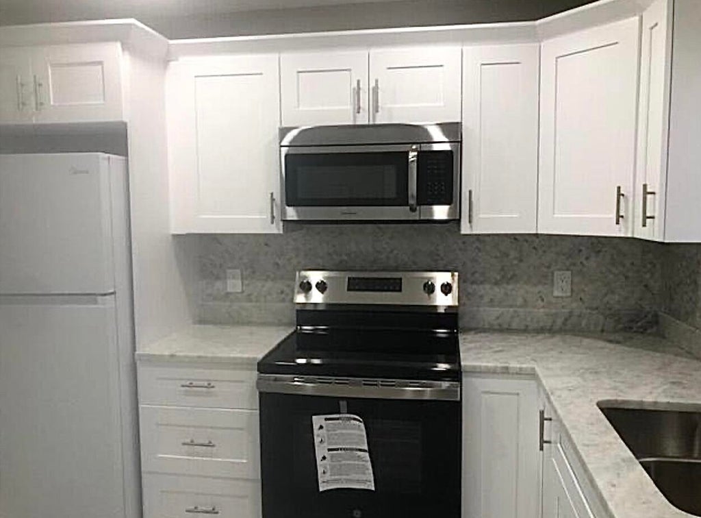 Photo of 21913 Lake Forest Circle #201, Boca Raton, FL 33433 (MLS # R11069788)