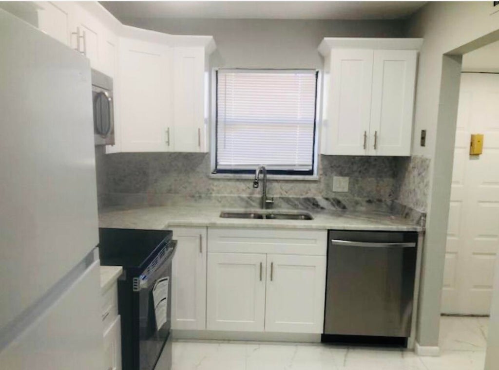 Photo of 21913 Lake Forest Circle #201, Boca Raton, FL 33433 (MLS # R11069788)