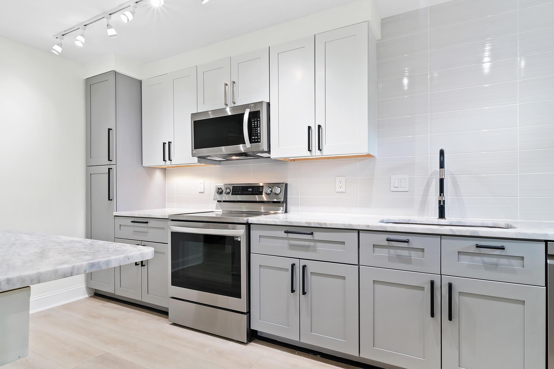 Jaw dropping apartment at The Coastal! Some photos virtually STAGED. 55'' Samsung 'The Frame' TV, LED lighting throughout, LG Energy Star appliances, dolomite stone counter tops, upscale finishes, new Friedrich AC units, adjustable bed, night stands, dresser walk-in closet, and Bryant Park is your backyard! Gorgeous open living space, dine in kitchen, sublime remodeled bath. Upscale tile and finishes everywhere! Launch from the Public Boat Ramp or jump in a kayak & paddle the ICW (at its widest). Walk to the beach (or get a Parking Pass), Municipal Golf Course, shopping, restaurants, & world class entertainment. Surf, swim, paddle, play everyday! Reverse osmosis filtered water flows from the taps!! Don't miss this chance to leave the stress, decompress, LOVE WHERE YOU LIVE!