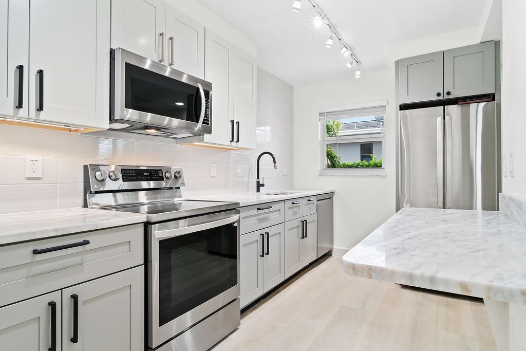 Photo of 122 S Lakeside Drive #3, Lake Worth Beach, FL 33460 (MLS # R11113989)