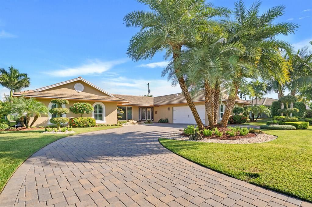 Photo of 212 Gleneagles Drive, Atlantis, FL 33462 (MLS # R10747757)