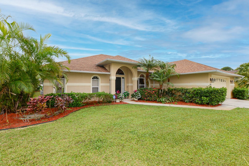Photo of 1014 SW Charcoal Avenue, Port Saint Lucie, FL 34953 (MLS # R11053299)
