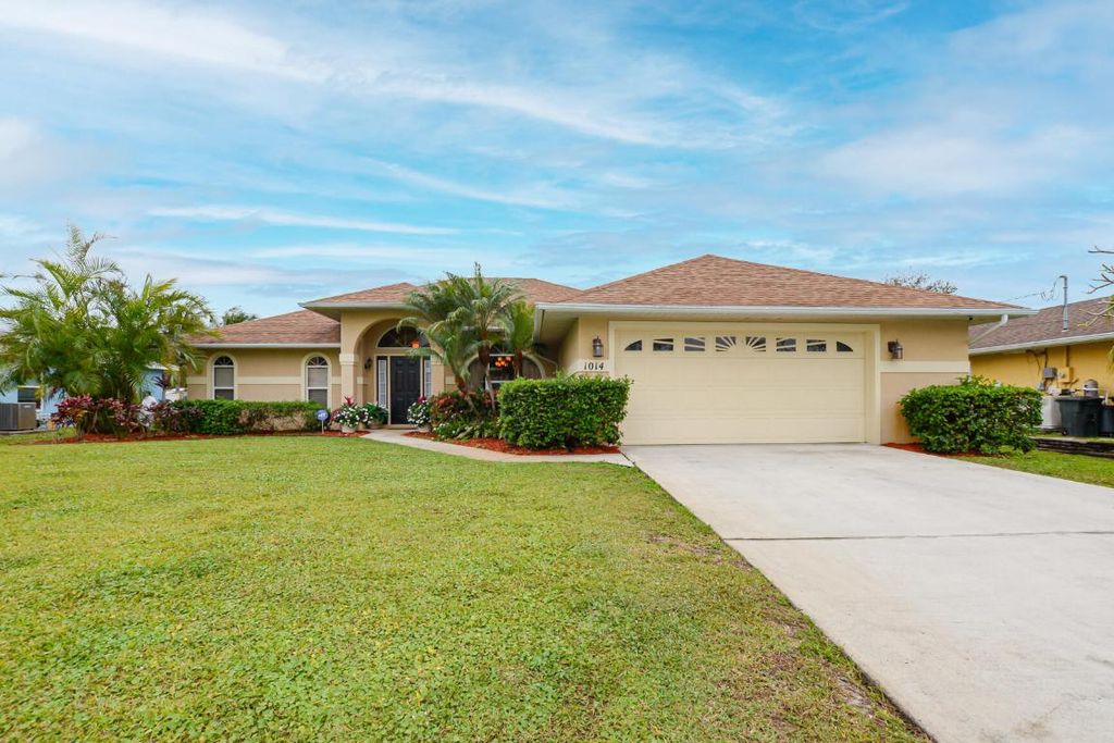 Photo of 1014 SW Charcoal Avenue, Port Saint Lucie, FL 34953 (MLS # R11053299)