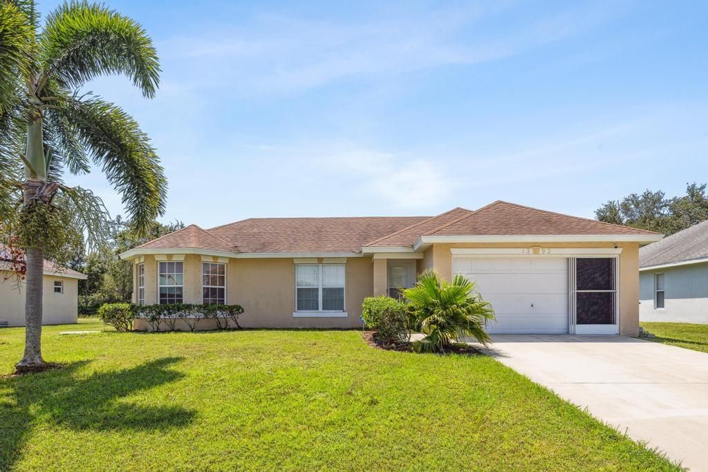 Photo of 1392 SW Sudder Ave, Port St Lucie, FL 34953 (MLS # F10399179)