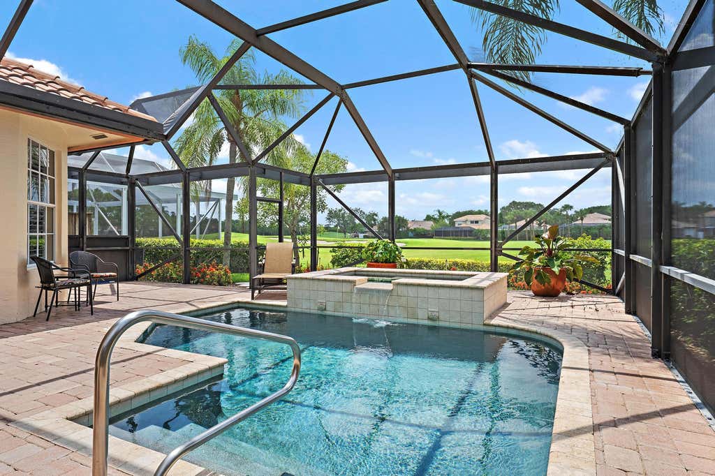 Photo of 10350 Osprey Trace, West Palm Beach, FL 33412 (MLS # B26046424)