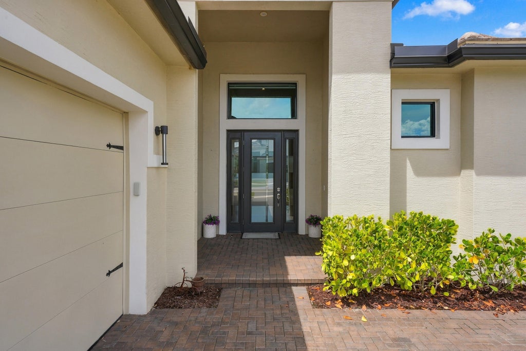 Photo of 8252 SW NORCIA Way, Port Saint Lucie, FL 34987 (MLS # B26080635)