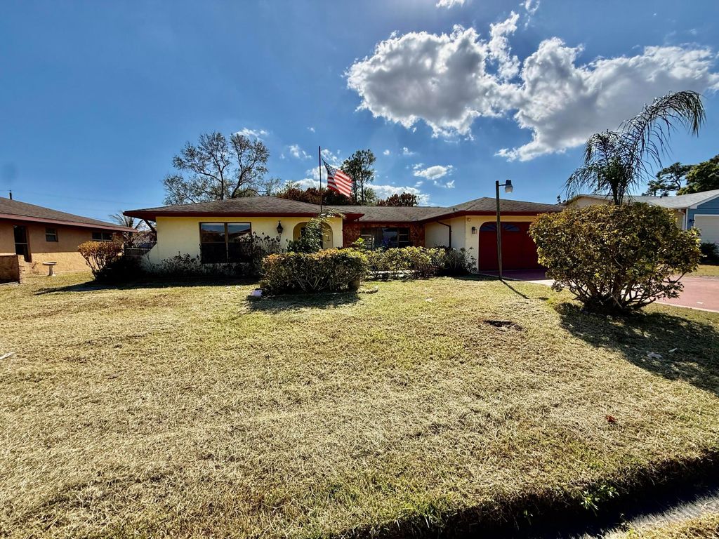 Photo of 162 SW Ewing Avenue, Port Saint Lucie, FL 34983 (MLS # R11162200)