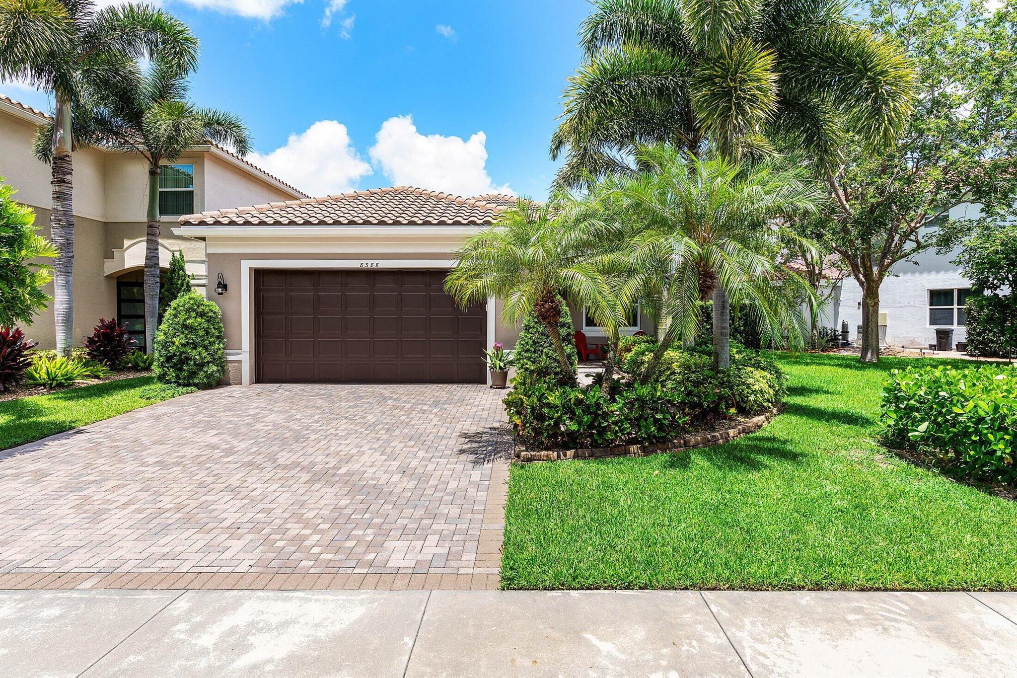 Welcome to this beautiful home located in the desirable Canyon Trails community. Well kept by its original owners, this 3-bedroom, 2- bathroom, 2 car garage home combines comfort and quality. Some features include: IMPACT windows, New A/C installed in Sep 2023 and Newer washer & dryer. Enjoy tile flooring across the entire home and a spacious open layout. The kitchen features a large peninsula with granite countertops, 42'' wood cabinets and ample storage. The 3rd room, currently used as an office, can be converted into a bedroom. The primary bedroom offers stunning lake views and includes his and hers walk-in closets and an en-suite bathroom with a separate soaking tub and shower, and dual vanities with marble counters. Finally step outside to a screened-in patio overlooking the lake.