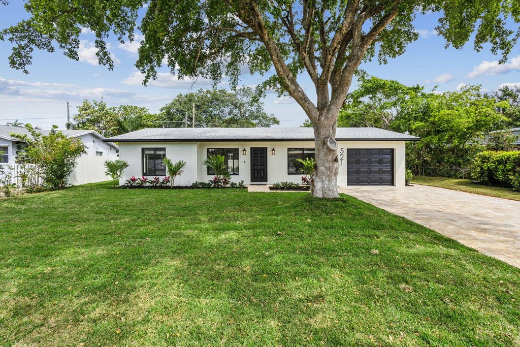Photo of 521 Curlew Road, Delray Beach, FL 33444 (MLS # R10974824)