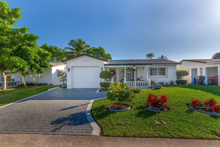 Ready when you are***Back on the market***Buyer did not get approved by the association***The kitchen says, "Let's cook".***Breakfast by the canal***Fully renovated***House boasts 2 large bedrooms and 2 bathroom***an extra bedroom or office comes off the back porch***One car garage***Fruit trees (bananas, avocados, soursop, pineapples)***New permitted roof***Low HOA fees less than $100/Monthly***HOA states one person occupying the property must be 55+, everyone else must be over 18 years of age***Close to FL-Turnpike, I-95, SR-7 and University DR*