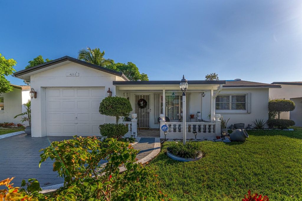 Photo of 4290 NW 45th Terrace, Lauderdale Lakes, FL 33319 (MLS # F10544456)