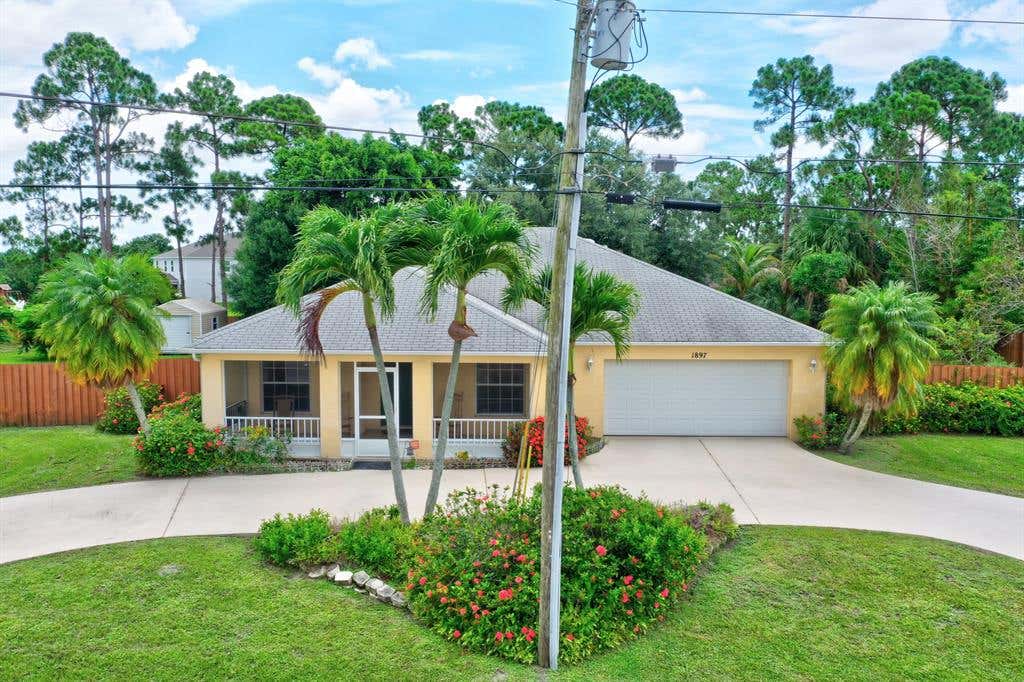 Photo of 1897 SW Capehart Avenue, Port Saint Lucie, FL 34953 (MLS # R10726679)