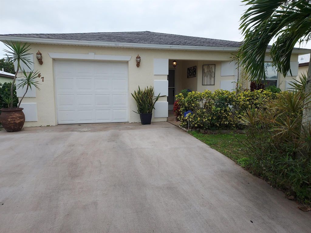 Photo of 47 Florida Way, Port Saint Lucie, FL 34952 (MLS # R10961582)