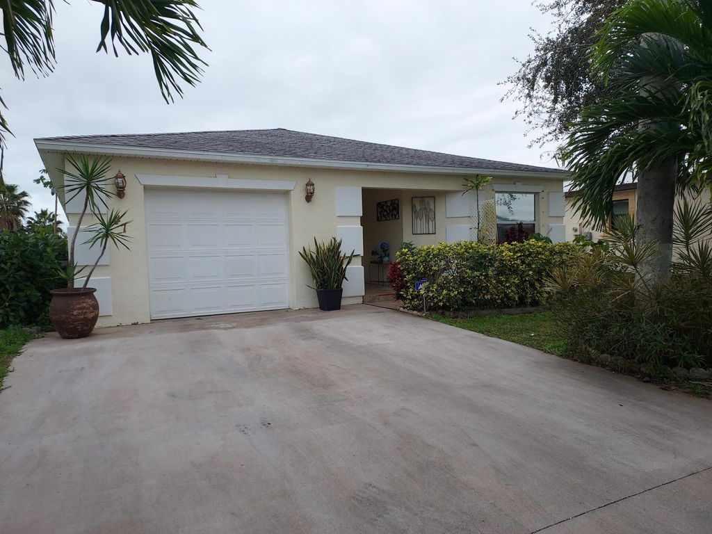 Photo of 47 Florida Way, Port Saint Lucie, FL 34952 (MLS # R10961582)