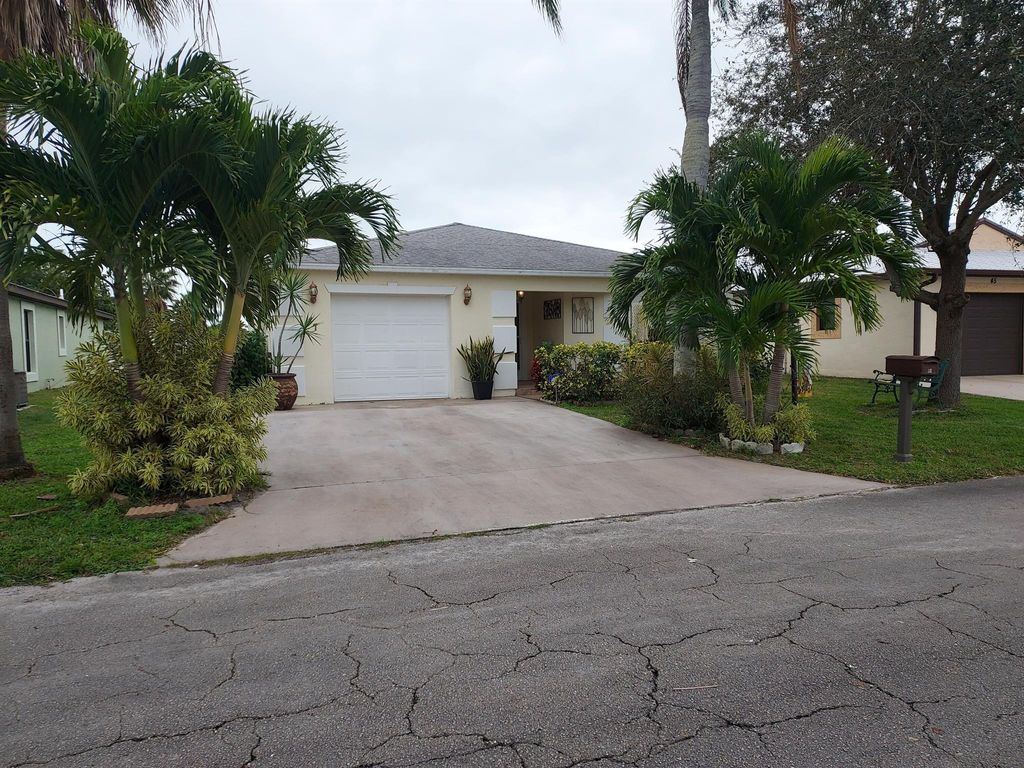 Photo of 47 Florida Way, Port Saint Lucie, FL 34952 (MLS # R10961582)