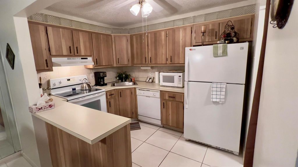 Photo of 325 Pine Ridge Circle #D-2, Greenacres, FL 33463 (MLS # R10952499)
