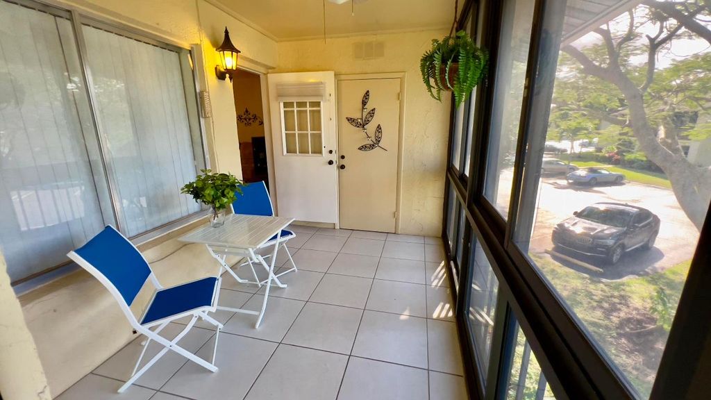 Photo of 325 Pine Ridge Circle #D-2, Greenacres, FL 33463 (MLS # R10952499)